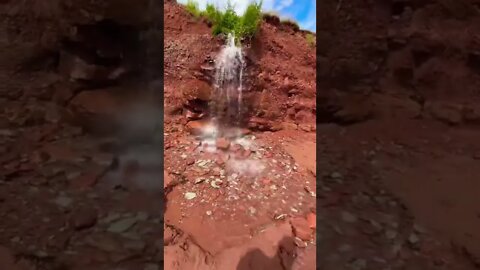 Water flowing off a cliff