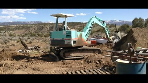 Yanmar YB 451 Excavator Moving a Berm