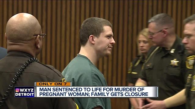 Man sentenced to life in prison for murder of pregnant woman in Detroit smirks at family