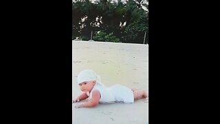 Little guy happy alone in beach