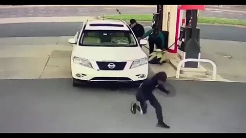 Car stolen from man refueling his car in broad daylight.