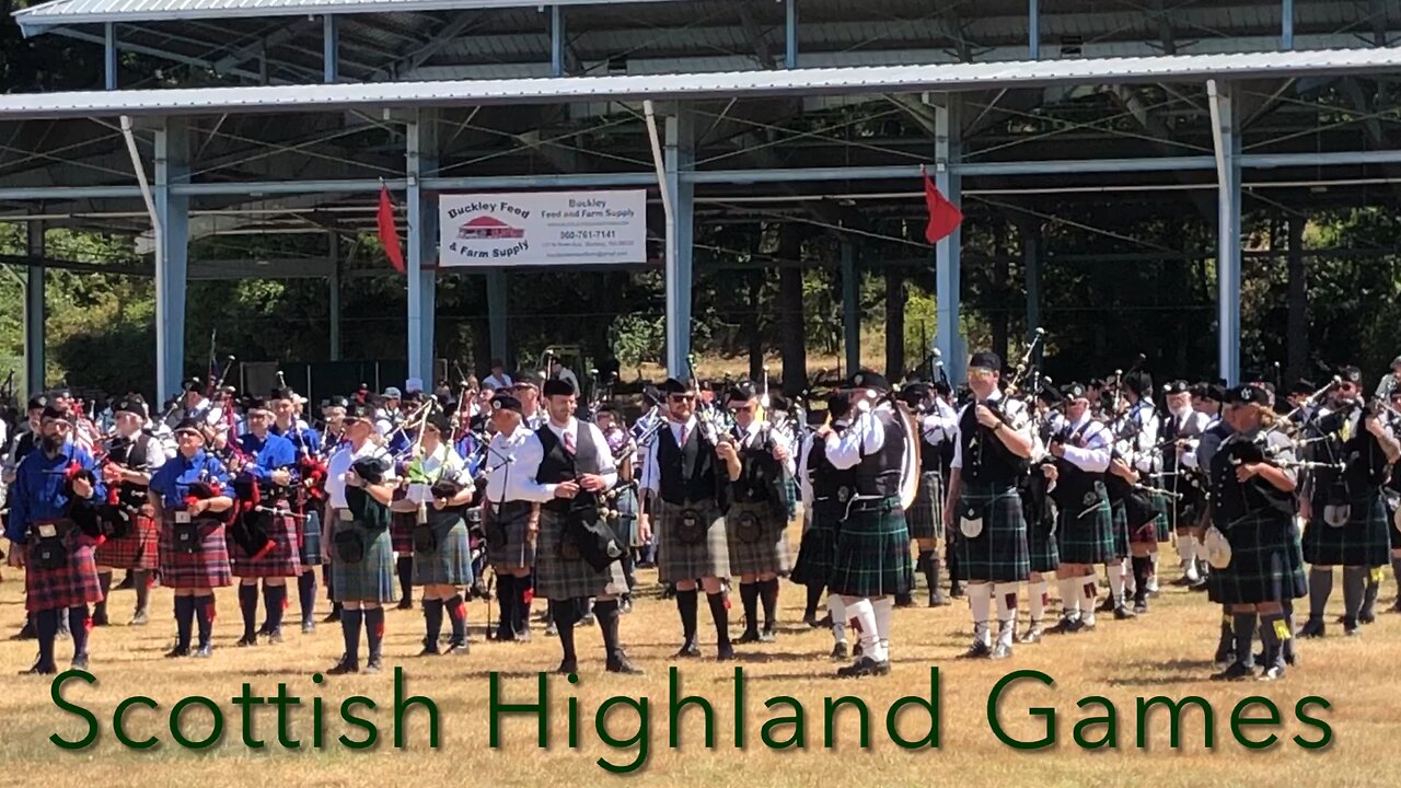 Hundreds of Pipers and Drummers March Together