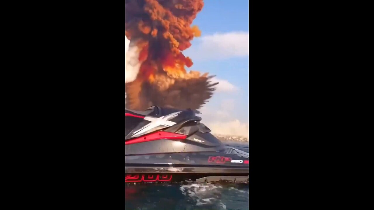 Jet ski rider dodges shockwave by jumping into water after explosion