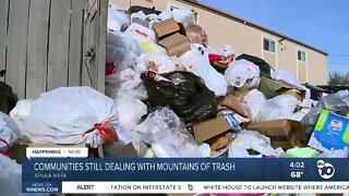 Communities still dealing with mountains of trash