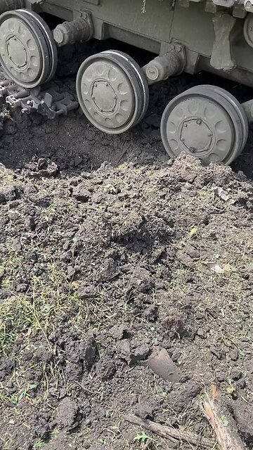 A heavy multi-purpose tracked transporter-tractor MT-T of the Ukrainian army blown up by a mine.