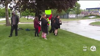 Students walk out of high school over sexual assault allegations with support of parents