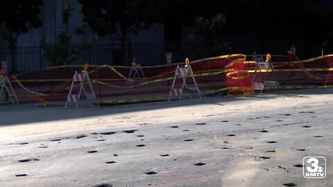 Hole-y Moley! Massive hole in the road blocks traffic on Jackson in downtown Omahai