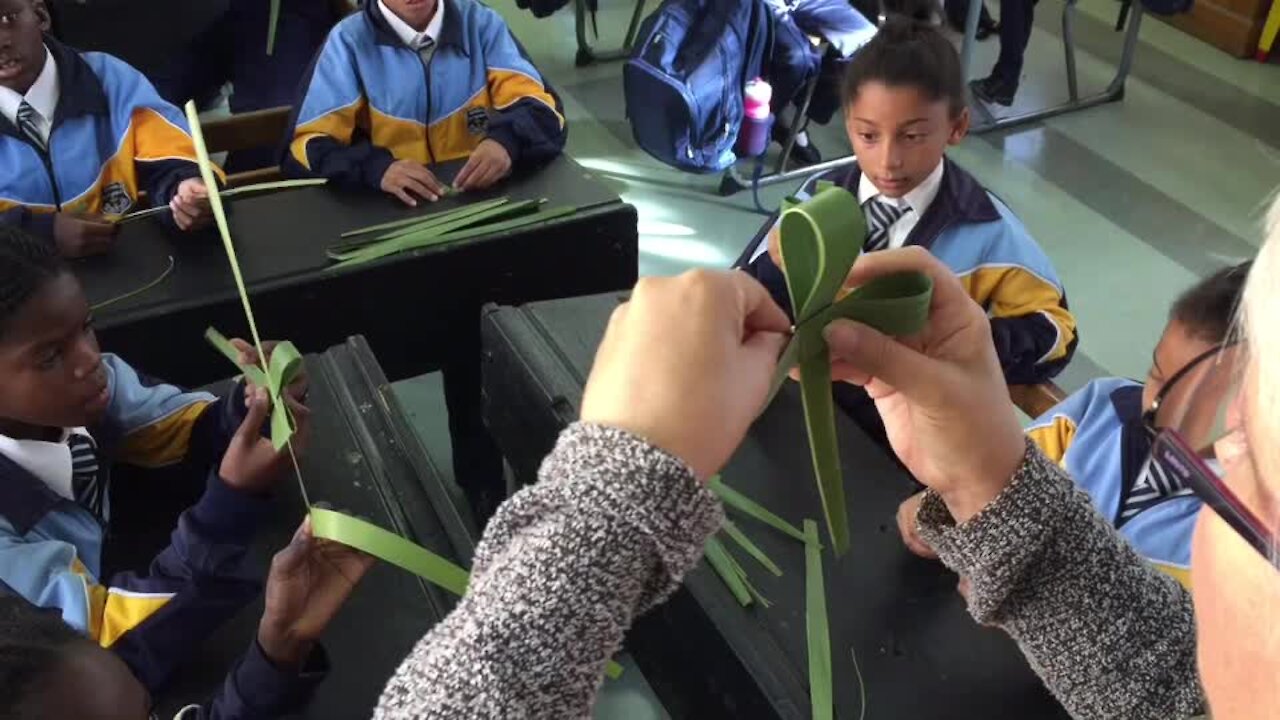 SOUTH AFRICA - Cape Town - Grade 4 students making palm crosses for Palm Sunday. (Video) (9wm)