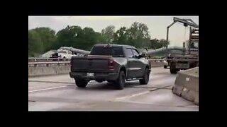 Sign falling on truck on Highway 412