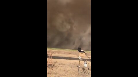 wind, smoke in Guymon, Okla.