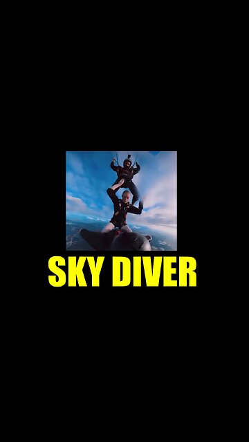 Skydiver hitch a ride on a wingsuit flyer