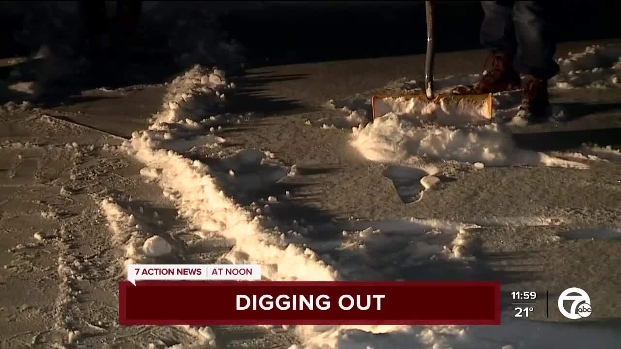 eenan helped a woman shovel snow early this morning