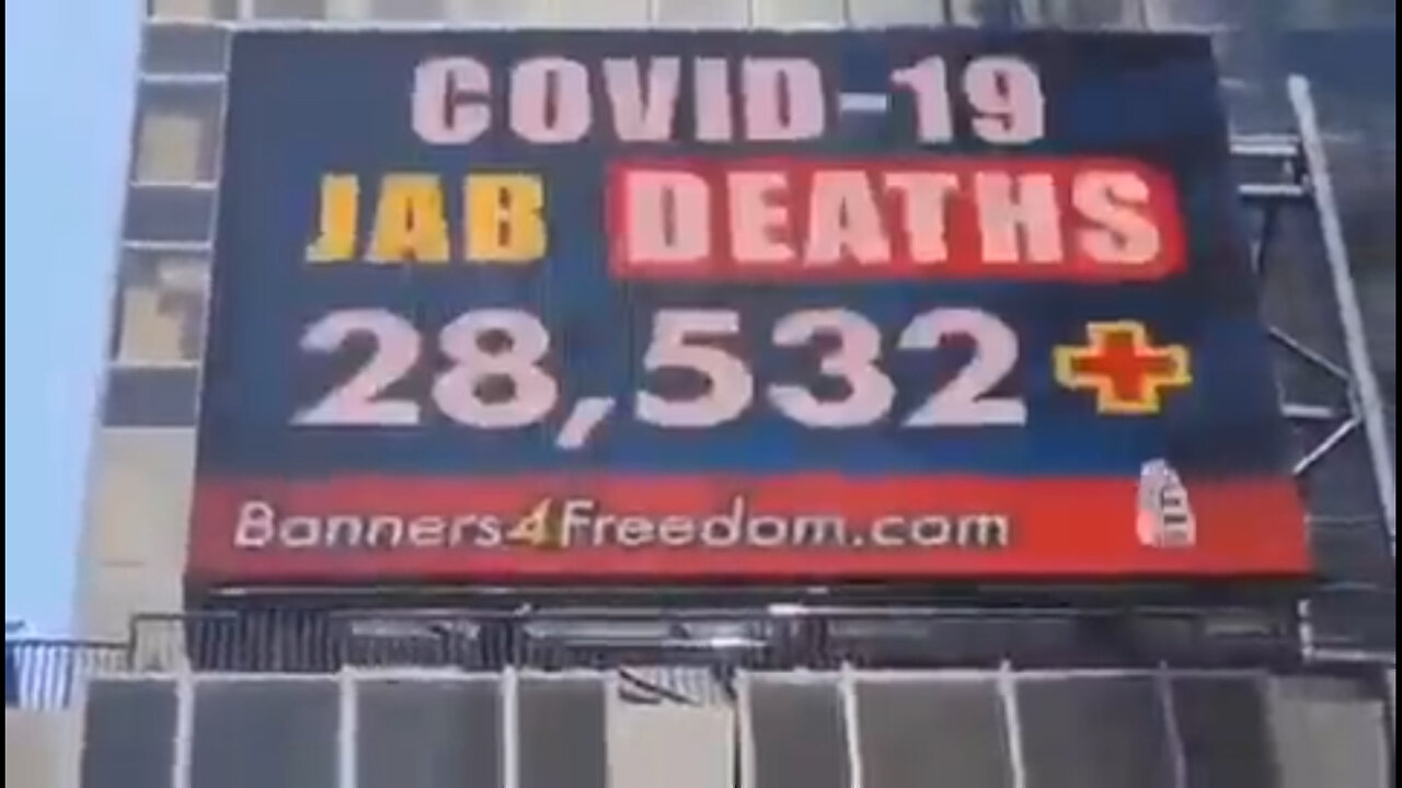 In New York City, Times Square. Covid -19 jab deaths.