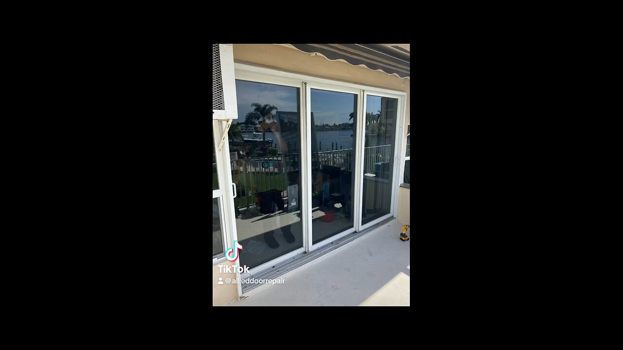 Hurricane impact sliding glass door repair; roller replacement and track refurbishing