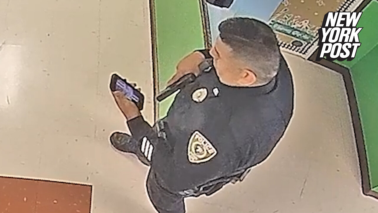 Uvalde officer checks phone with Punisher lock screen during shooting