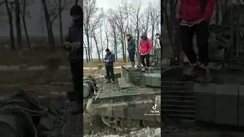 Locals investigating abandoned tanks