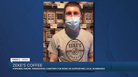 Zeke's Coffee says "We're Open Baltimore!"