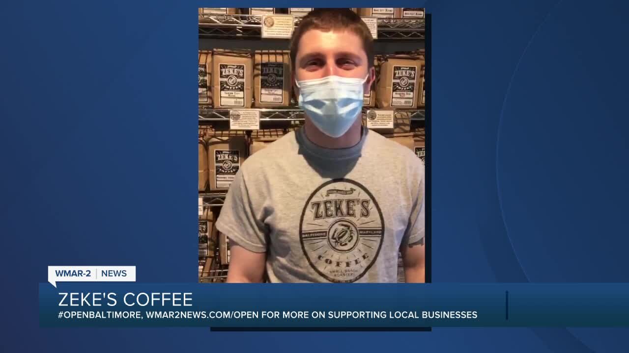 Zeke's Coffee says "We're Open Baltimore!"
