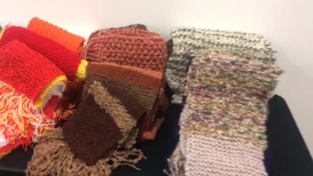 MarksNelson employees knit scarves for homeless