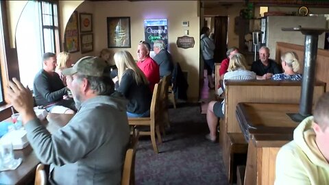 Customer's seen waiting for tables at restaurants, bars as reopening plans continue