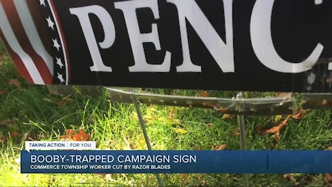 County worker hurt while moving political sign with razor blades attached