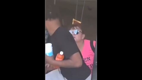 Black guy kicks white woman to the ground