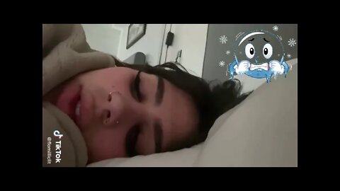 Girl was cold and teeth chattering from the cold under the covers