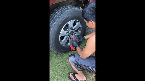 Filipino ilocano man uses electric impact tool. Music to our ears