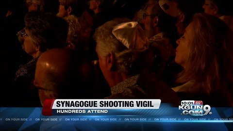 Candlelight vigil honors synagogue shooting victims