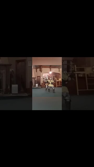 Poleaxe Grapple ending with Butt Spike