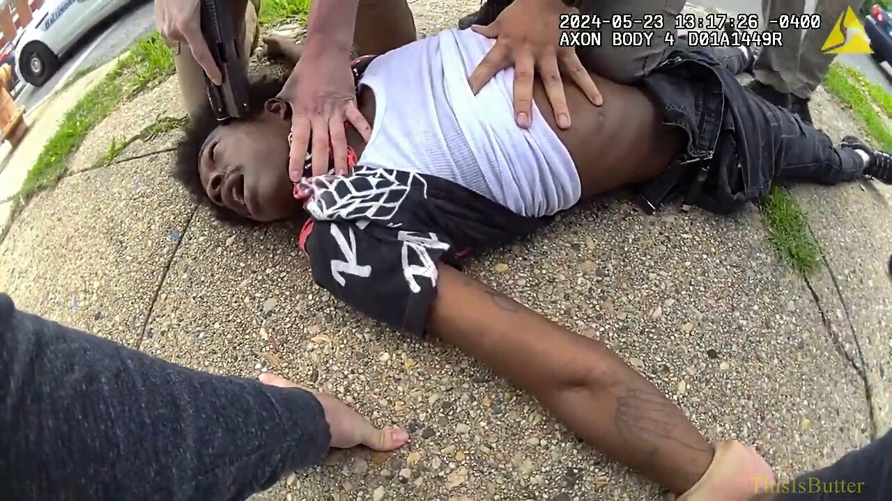 Baltimore City release bodycam of an officer placing gun against the suspects' temple during arrest