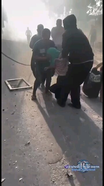 10/7/23 - Old men, young kids and other "Innocent civilians" took a kidnapped Israeli woman to Gaza!