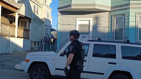 Boston police respond to 58 Barry Street for a man with a knife