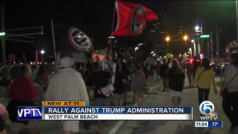 Anti-Trump protesters march through downtown West Palm Beach