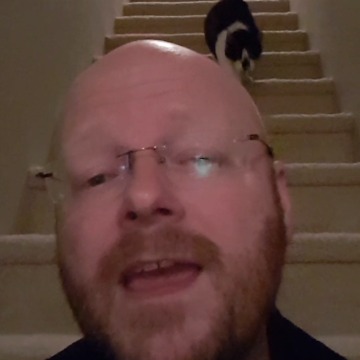 A Guy Sings About His Cat's "Business"