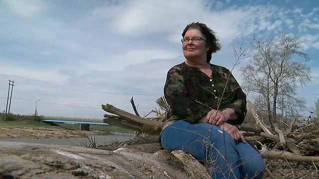 Cheryl Durkin's sister remembers while sitting on the riverbank where her torso was found