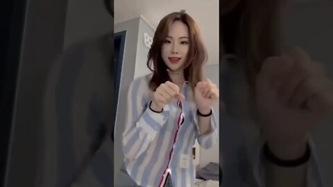 Beautiful Chinese Girl Drives A Motorcycle Through Her Bedroom