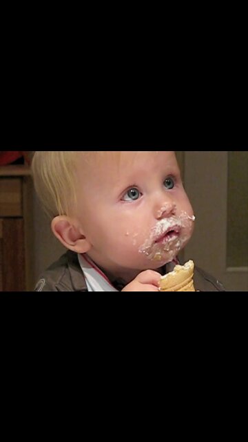 Funny Babies making face eating ice cream