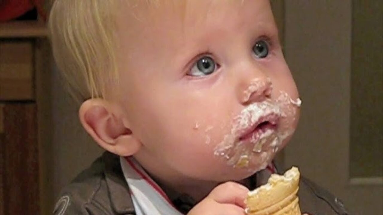 Funny Babies making face eating ice cream