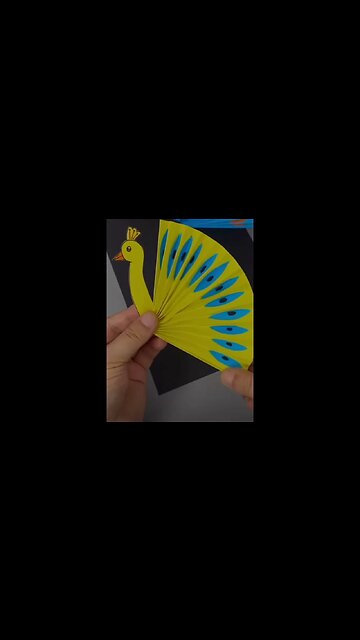 "Fun and Colorful Paper Peacock Craft for Kids"