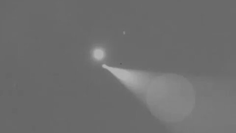 low enormous sphere UFO visits thru foggy clouds