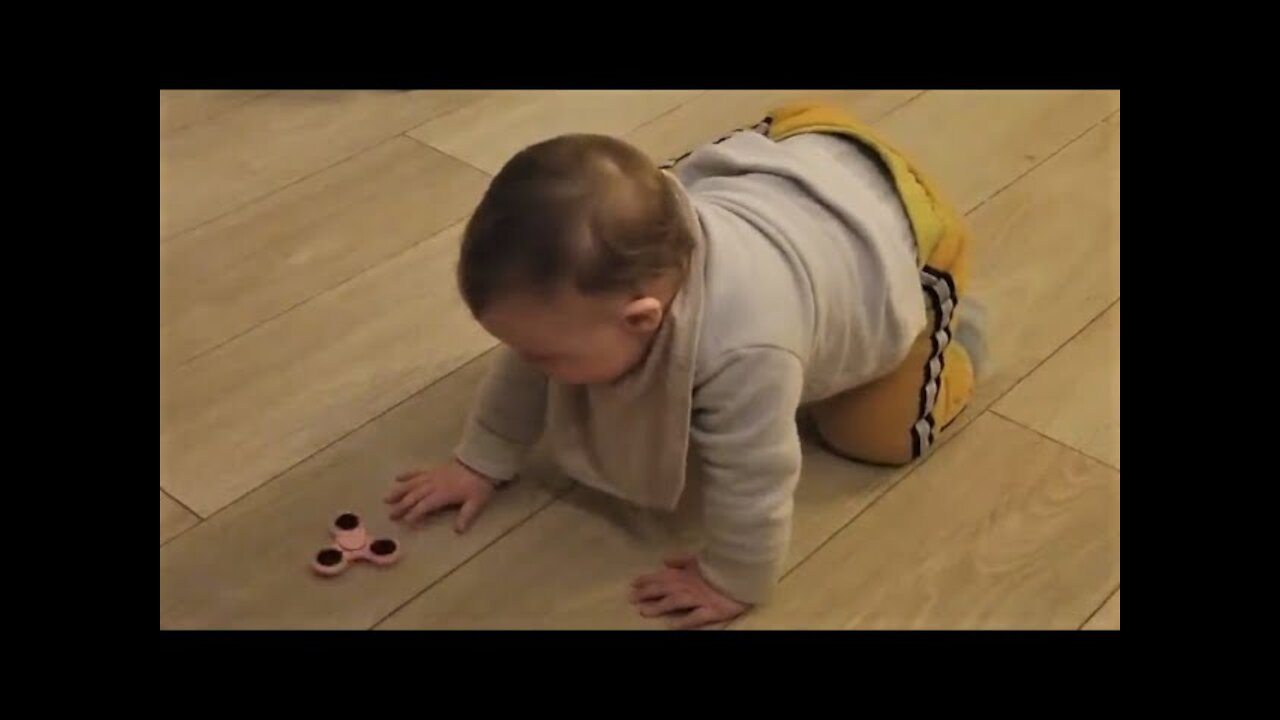 Cute Baby Boy Loves Playing with Fidget Spinner - Funniest Home Videos