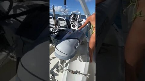 Using a crane to lift our dinghy off the top deck of our yacht #yacht #shorts #caribbean