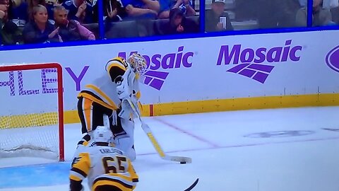 Penguins G Tristan Jarry scores a goal.