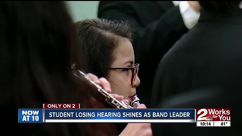 Edison High student losing hearing shines as band leader