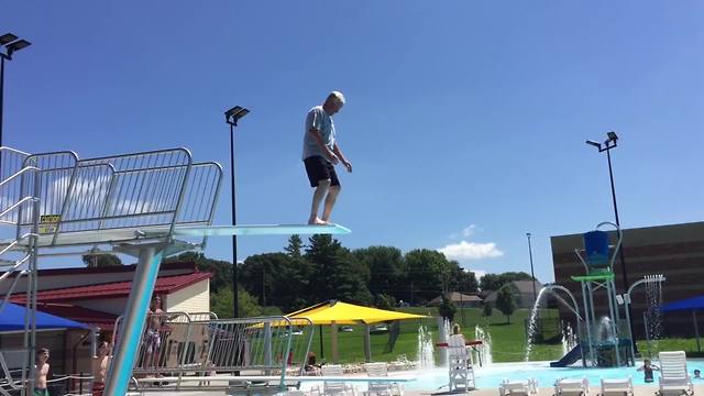 A Man In His Golden Years Makes An Amazing Jump Off A Diving Board
