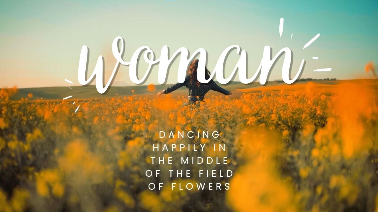 A Woman Dancing Happily In The Middle Of The Field Of Flowers