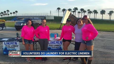 Volunteers do laundry of hard-working linemen