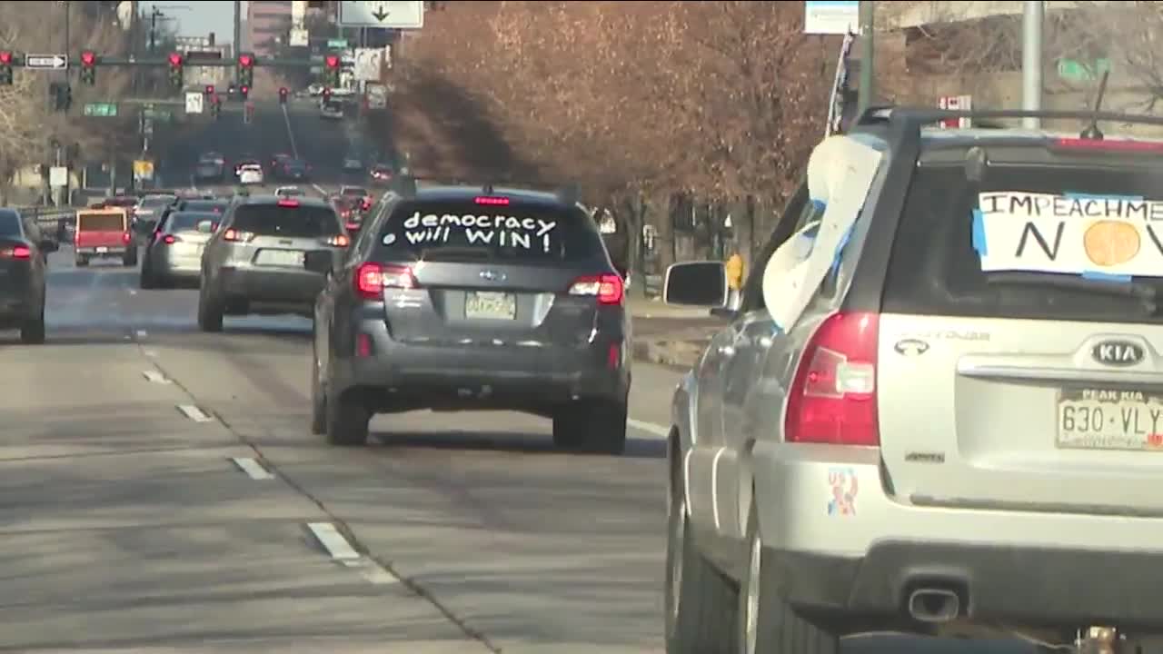 Protesters roll through Denver demanding Trump impeachment