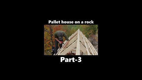 Pallet house on a rock